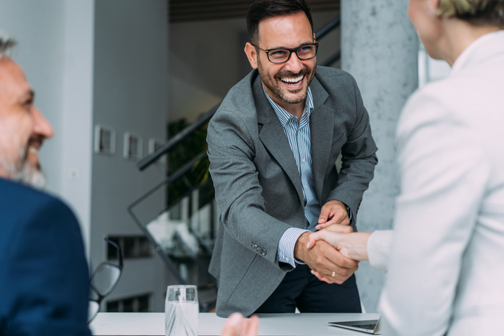 Business hand shake greeting.