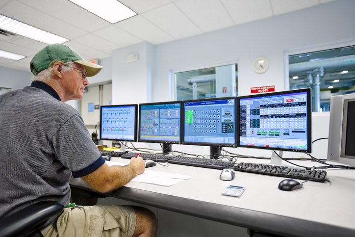 Operations manager overseeing systems