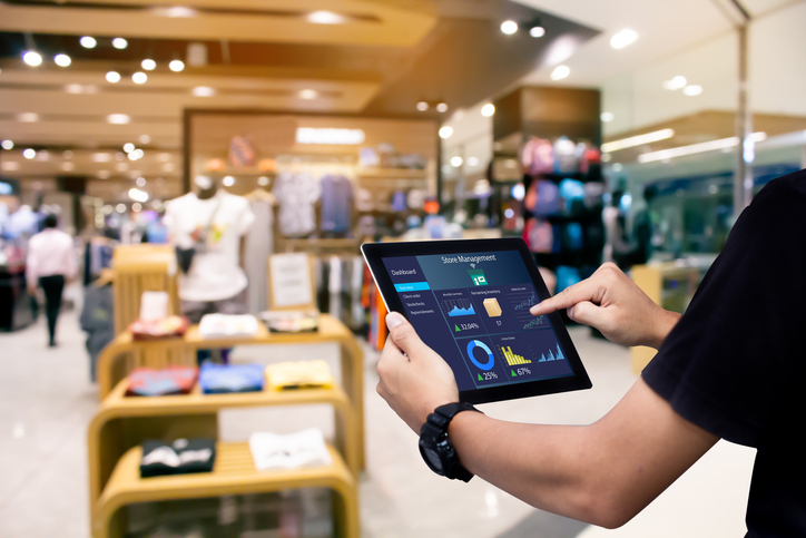 Retail Manager using tablet